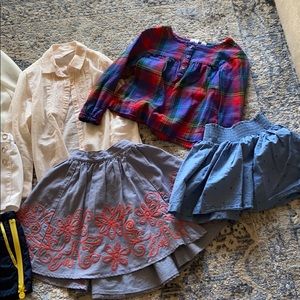 Lot of kid clothes 3 shirts, 2 shorts 2 skirts